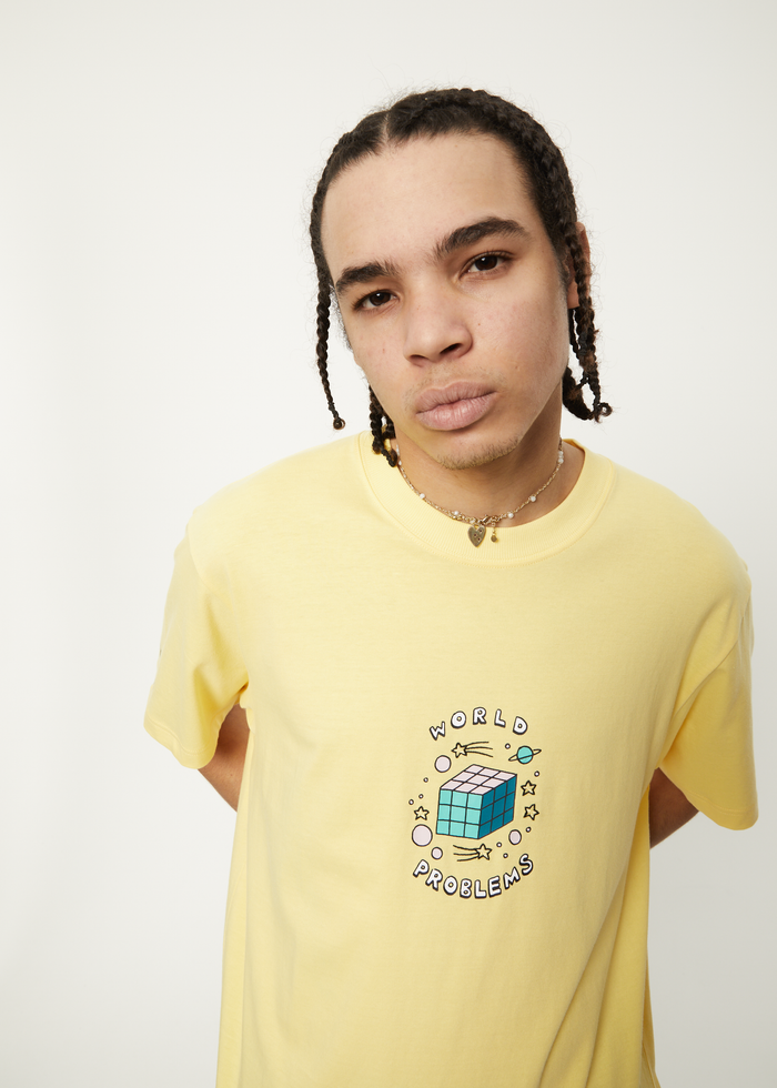 Afends Mens World Problems - Recycled Retro Graphic T-Shirt - Butter - Sustainable Clothing - Streetwear