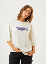 Afends Womens Tracks - Recycled Oversized T-Shirt - Off White - Https://player.vimeo.com/progressive_redirect/playback/692942966/rendition/1080p?loc=external&signature=41b05c44d134024de997fe3a71be0fdc142eae93f95fa41c4c4a27e8d6b60fd3
